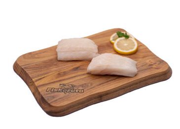 Premium ferskfrossen steinbitfilet fra Fiskeruta - fast, hvitt kjøtt med delikat smak, ideell for ulike retter som grilling, steking og wok